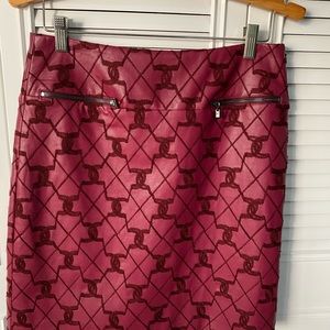 Short, burgundy leather like skirt